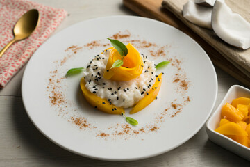 Mango Sticky Rice. Sticky rice cooked with coconut milk with fresh fruit.