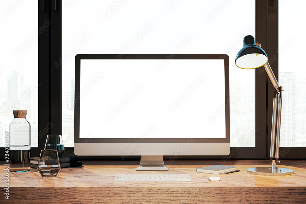 Poster Bright designer desktop with empty white computer monitor, lamp, supplies and other items. Window with city view in the background. Mock up, 3D Rendering.