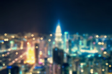 Abstract blurry bokeh lights night city backdrop. Skyline and landing page concept.