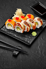 Philadelphia rolls with salmon, tobiko, eel, sesame and unagi sauce