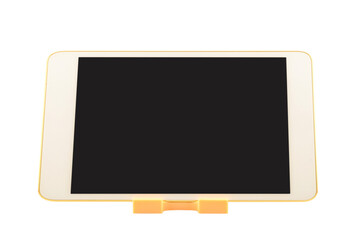 Tablet computer on stand with blank screen