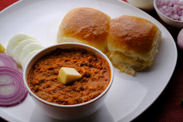 Pav bhaji is a fast food dish from India consisting of a thick vegetable curry served with bread.