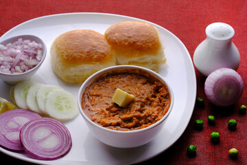 Pav bhaji is a fast food dish from India consisting of a thick vegetable curry served with bread.