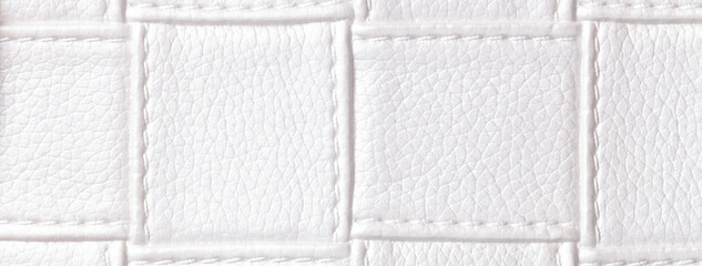 Texture of white leather background with square pattern and stitch, macro. Abstract backdrop from...