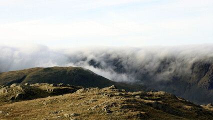 Beautiful mountainous landscape with billowing clouds