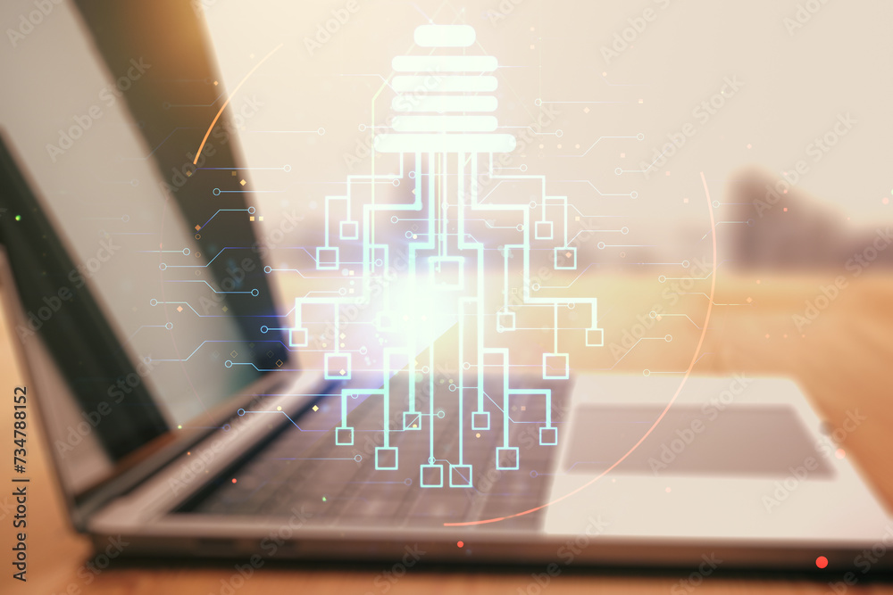 Poster double exposure of creative light bulb hologram with chip on laptop background, idea and brainstormi