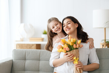 daughter and mom with flowers