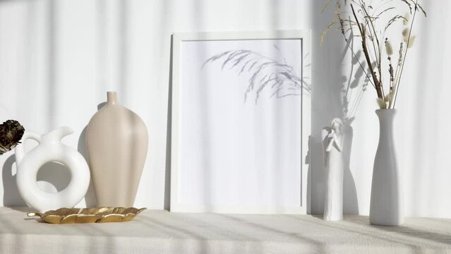 Video photo frame mockup with beige vase and dry flowers