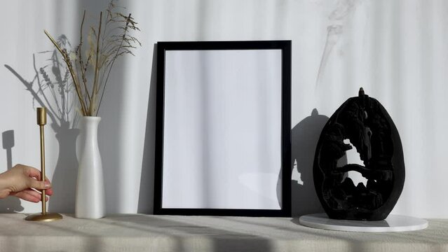 Video photo frame mockup with white vase and dry flowers