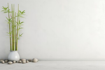 bamboo shoots in a vase beside spa space with a blank wall