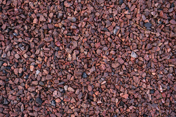 Red crushed stone, horizontal background for design