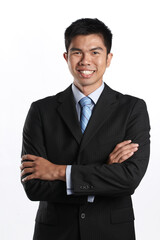 Asian business man with arms crossed.