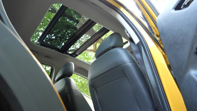 Tilt Glass Sunroof And Sun Curtain Sliding And Opening Bottom View From Rear Seats Video In 4K Resolution 