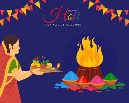Indian women performing holika dahan puja hindu festival burning of holika