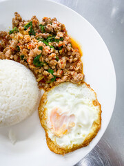 Rice topped pork with Thai basil and fried egg