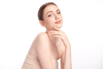 Naklejka premium Beautiful young woman with clean fresh skin on white background, Face care, Facial treatment, Cosmetology, beauty and spa, women portrait.
