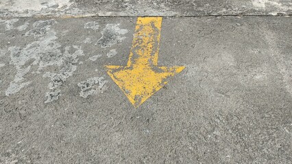 arrow on asphalt