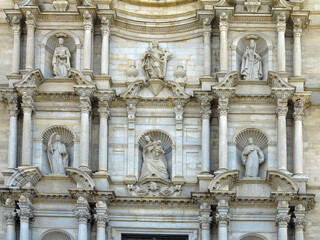 Gerona, Spain; July  12 - 2023: Architectural details of the medieval facade of the Saint Mary cathedral of the Gerona city
