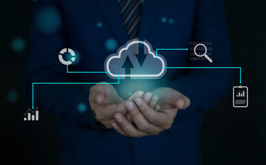 Big data analytics and business intelligence concept with chart and graph icons on a digital screen interface and a businessman in background