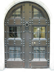 An ancient weathered stylish old wooden door isolated on white background