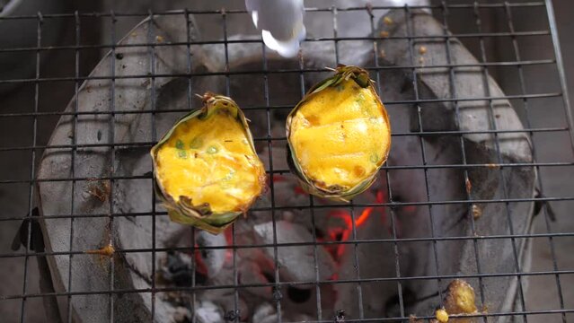 Grilled Khai Pam, a local dish of northern Thai people