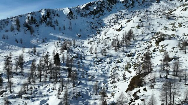Aerial drone Winter dolomites in Italy. Winter in Madonna di Campiglio village and a ski resort in Italy. Madonna di Madonna di Campiglio and ursus snowpark in Val Rendena dolomites trentino Italy. 