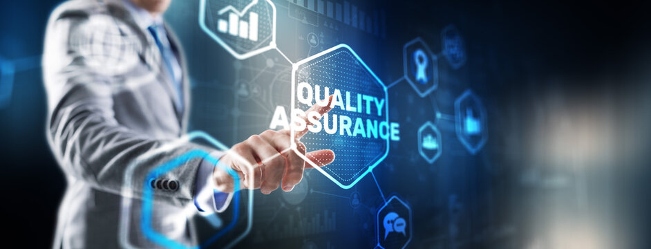 QA Businessman pressing Quality assurance button on virtual screens