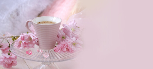 cup with drink coffee cappuccino, hot chocolate with milk, pink sakura flowers, caffeine improves...