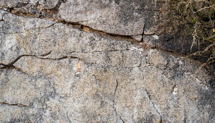 Natural old stone wall with cracked