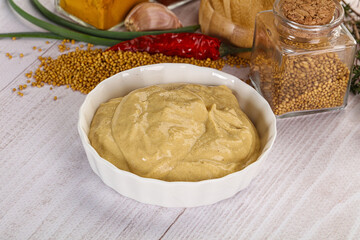 Dijon mustard sauce in the bowl