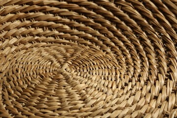 Empty wicker basket as background, closeup view