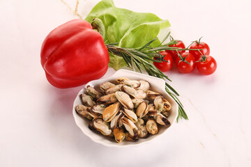 Marinated mussels in the bowl