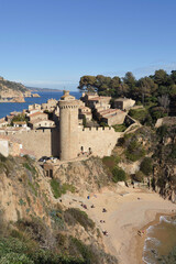 Fototapeta premium view of the medieval town of Tossa de Mar from the mountain near Cala es Codolar beach, Girona province, Catalonia, Spain