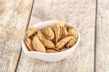 Shelled dry almond nut heap