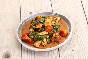 Chicken with tomato and spinach