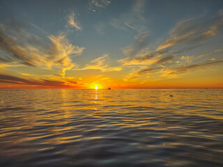 Sunset over the sea near Dana Point Harbor in Southern California - obrazy, fototapety, plakaty