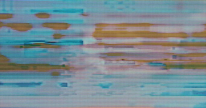 Close-up of colorful glitchy screen macro video
