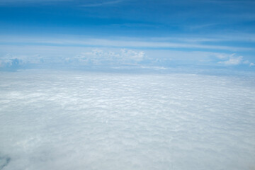 View of clouds in the sky from the plane, sky background.