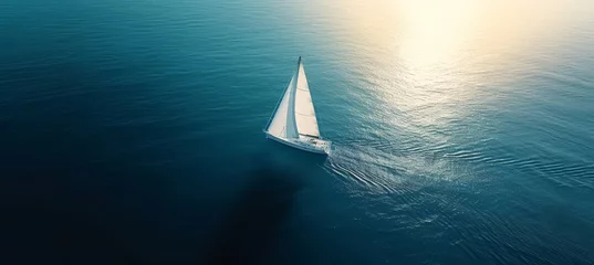 Deurstickers Aerial view of single sailing yacht with white sails on high seas, regatta sailboat with copy space © Andrei