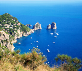 Rocks formations Faraglioni, Island Capri, Gulf of Naples, Italy, Europe.