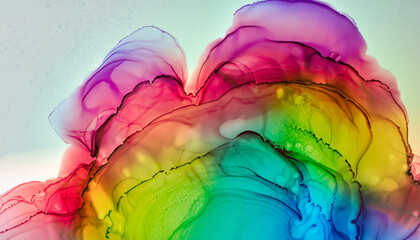 Macro close-up of abstract rainbow colored alcohol ink texture on white.