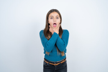 beautiful kid girl wearing blue sweater shouting suffocate because painful strangle. Health problem. Asphyxiate and suicide concept.