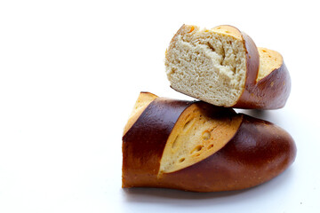 Plain Laugen bread on white background.