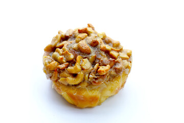 Butterscotch bread with raisin filling, topped with caramel-coated cashew nuts.