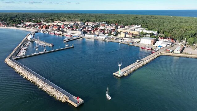 Port hel peniinsula in Poland.. Aerial view of Hel Peninsula in Poland, Baltic Sea and Puck Bay . Hel city .Photo made by drone from above. Hel seaport