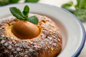 Mona de Pascua, sponge cake with boiled egg. Traditional Spanish dessert for Holy Week
