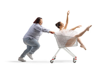 Woman pushing a ballerina inside a shopping cart