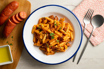 Macaroni dish with tomato sauce and Spanish chorizo.