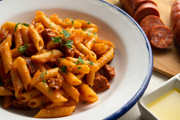 Macaroni dish with tomato sauce and Spanish chorizo.