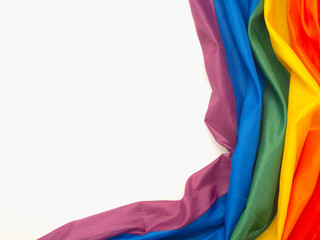 Part of the rainbow flag or LGBTQ flag is on a white background.